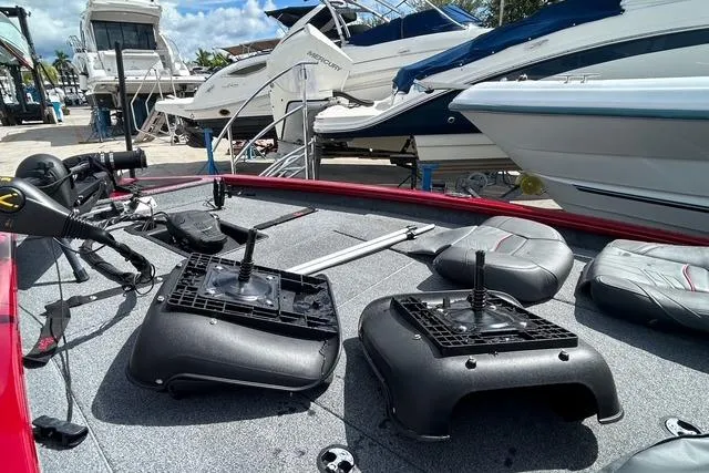Slide: The Image of 2022 Tracker Pro Team 190 TX Tournament Edition boat interior at marina. - 12