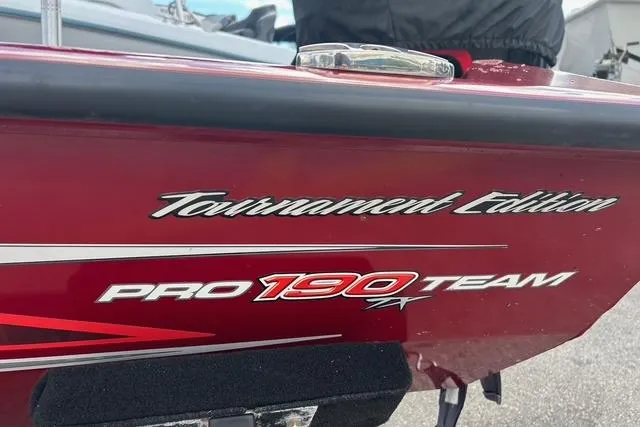 Slide: The Image of 2022 Tracker Pro Team 190 TX Tournament Edition boat, red exterior detail. - 23