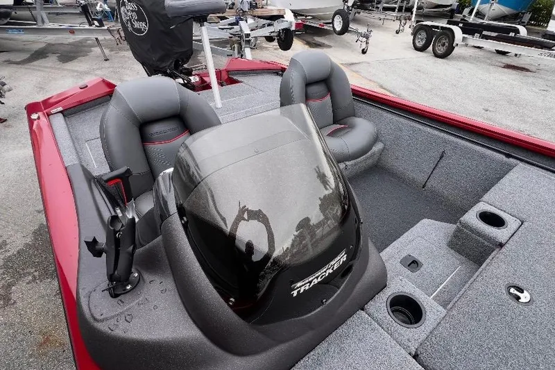 Slide: The Image of 2022 Tracker Pro Team 190 TX Tournament Edition boat interior with seating and console. - 7