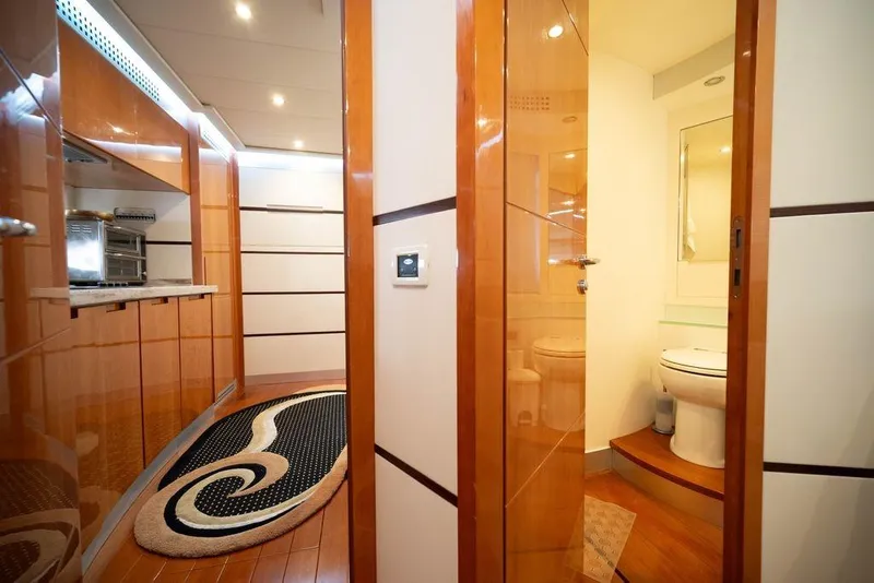 Slide: The Image of Luxurious interior of 2007 Pershing 62' yacht featuring modern kitchen and bathroom. - 15