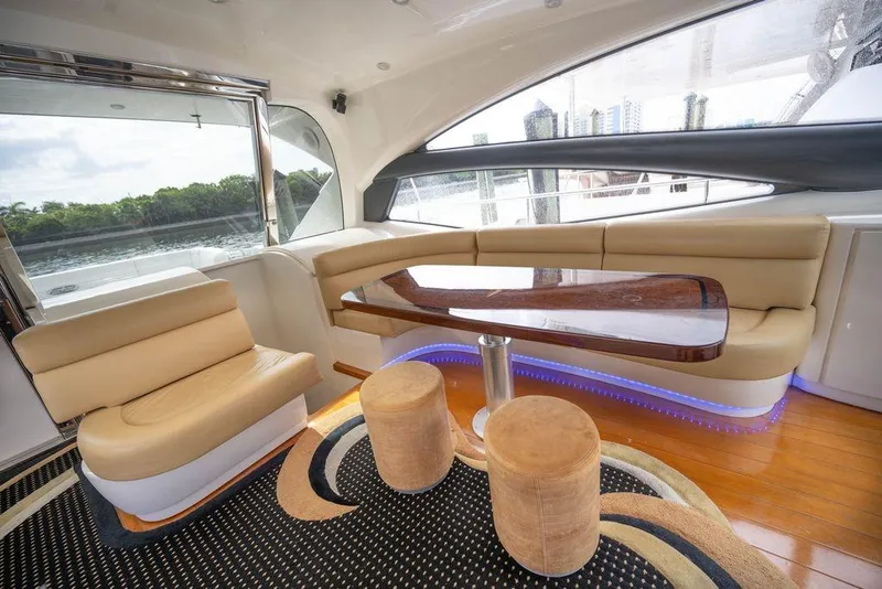 Slide: The Image of Luxurious interior of a 2007 Pershing 62' yacht with elegant seating and modern design. - 21