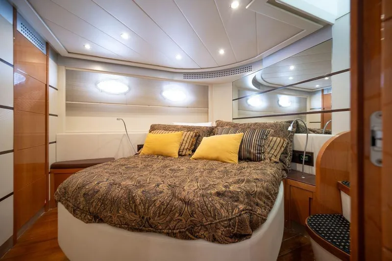 Slide: The Image of Luxurious bedroom interior of 2007 Pershing 62' yacht with elegant bedding and modern design. - 29