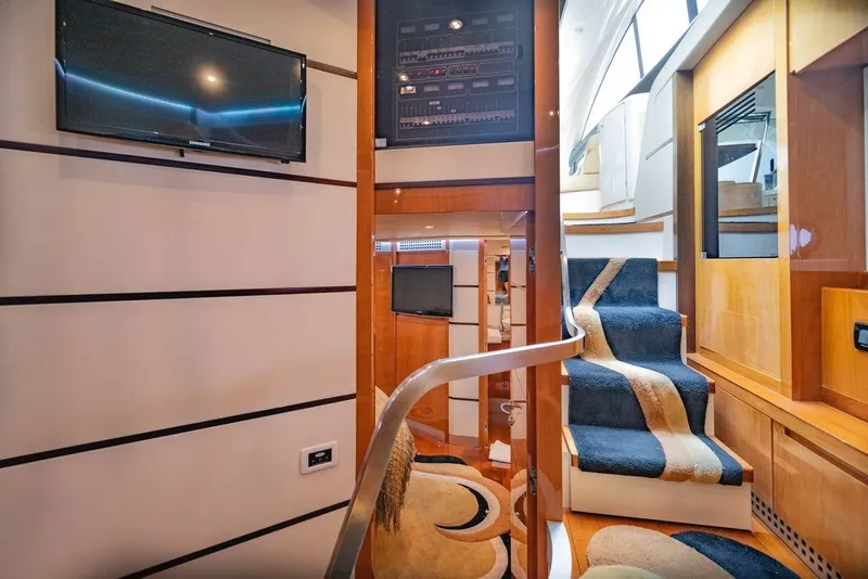 Slide: The Image of Luxurious interior of a 2007 Pershing 62' yacht with modern design and elegant furnishings. - 30