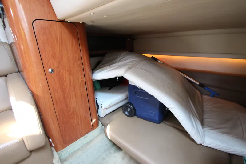 Slide: The Image of Interior cabin storage area of a 2008 Crownline 340 CR boat. - 38
