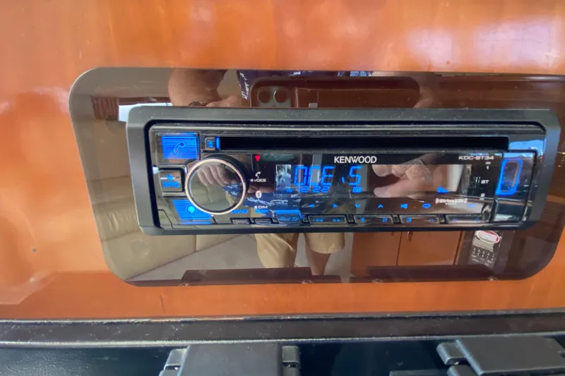 Slide: The Image of Kenwood stereo system in 2004 Carver 36 Super Sport boat interior. - 19