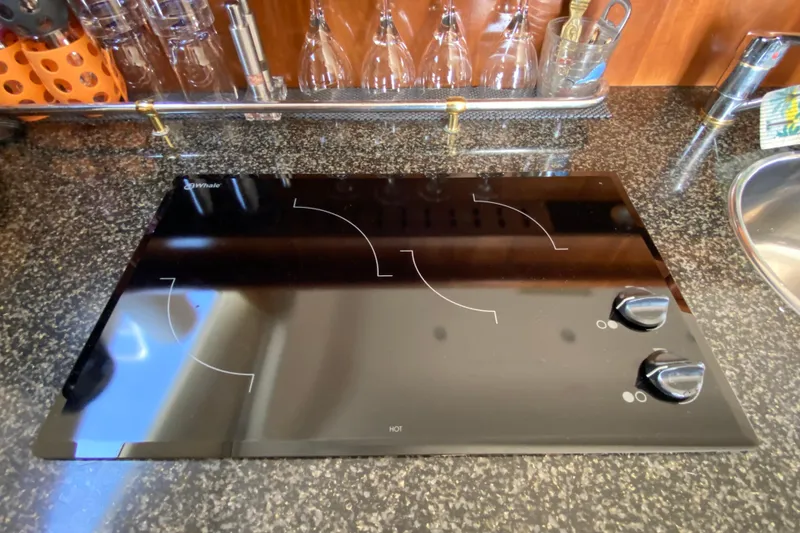 Slide: The Image of Black glass cooktop on Carver 36 Super Sport yacht, 2004 model. - 14