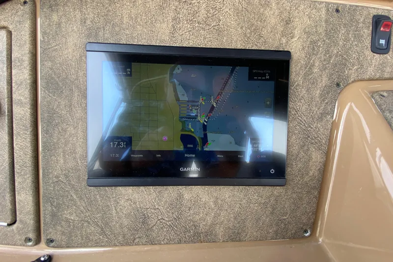 Slide: The Image of Garmin navigation display on 2004 Carver 36 Super Sport boat dashboard. - 39