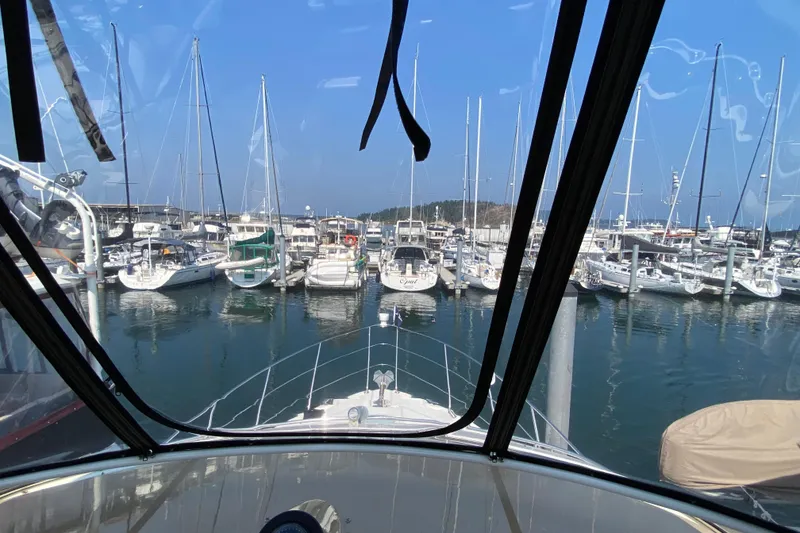 Slide: The Image of View from 2004 Carver 36 Super Sport yacht in a marina with sailboats. - 41