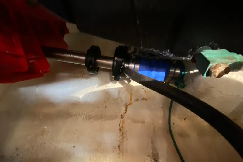 Slide: The Image of Close-up of mechanical components in a 2004 Carver 36 Super Sport boat. - 62