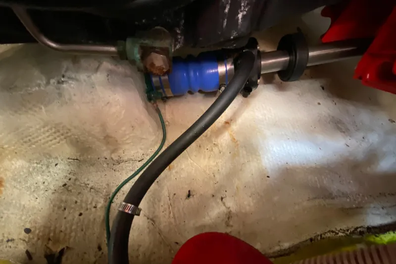 Slide: The Image of Close-up of 2004 Carver 36 Super Sport engine compartment with hoses and fittings. - 63