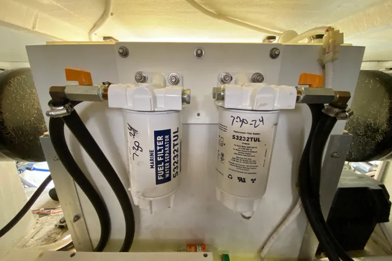 Slide: The Image of Marine fuel filter system in a 2004 Carver 36 Super Sport boat. - 69