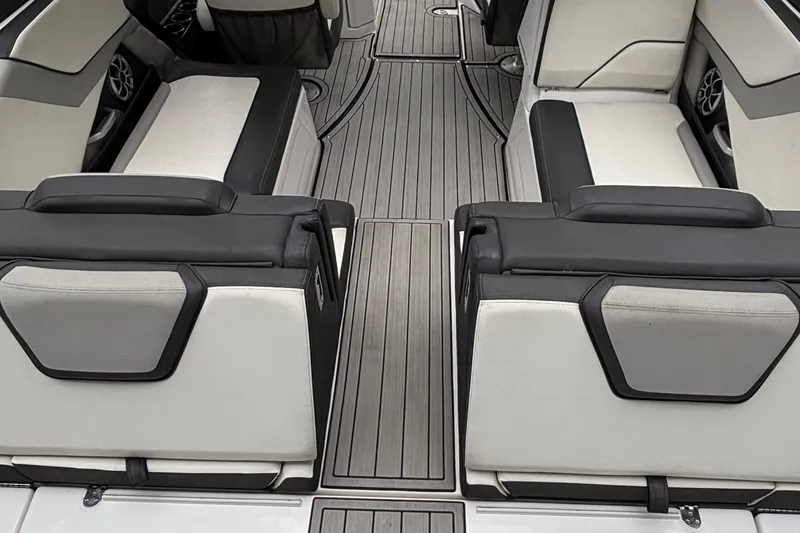 Slide: The Image of 2022 Yamaha Boats 252S interior with sleek seating and modern design. - 12