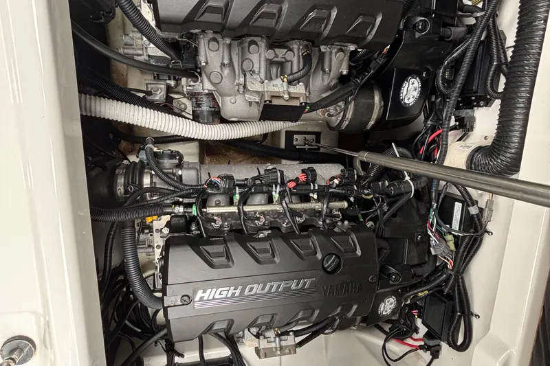 Slide: The Image of 2022 Yamaha Boats 252S engine compartment showcasing high output engines and wiring. - 13