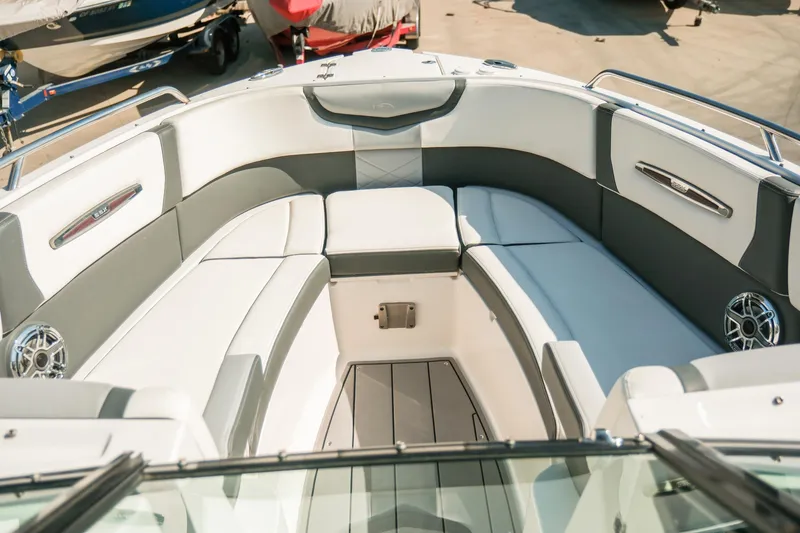 Slide: The Image of 2023 Chaparral 287 SSX boat interior with luxurious seating and modern design. - 9