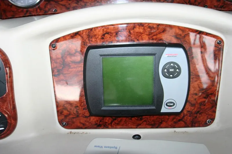 Slide: The Image of Control panel of a 2007 Sea Ray 320 Sundancer boat. - 25