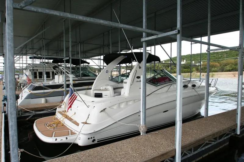 Slide: The Image of 2007 Sea Ray Sundancer 320 in a covered marina. - 49