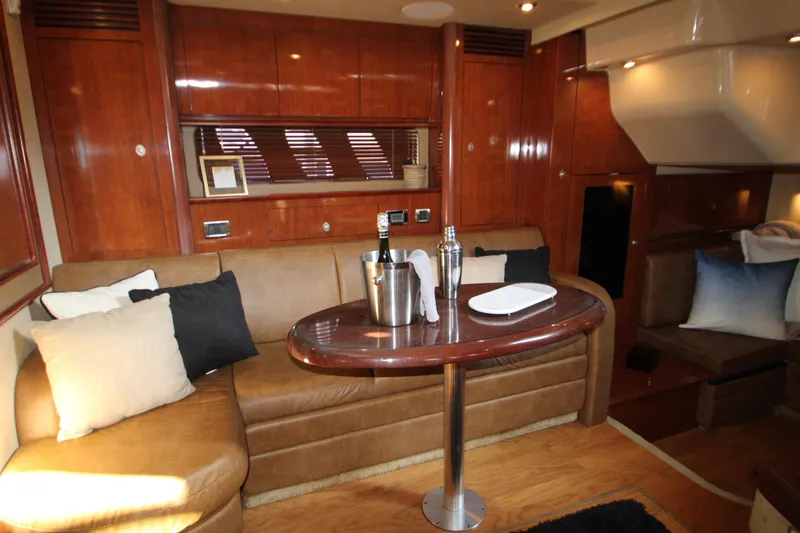 Slide: The Image of Luxurious interior of 2006 Sea Ray 400 Sundancer yacht with elegant wood finishes. - 20