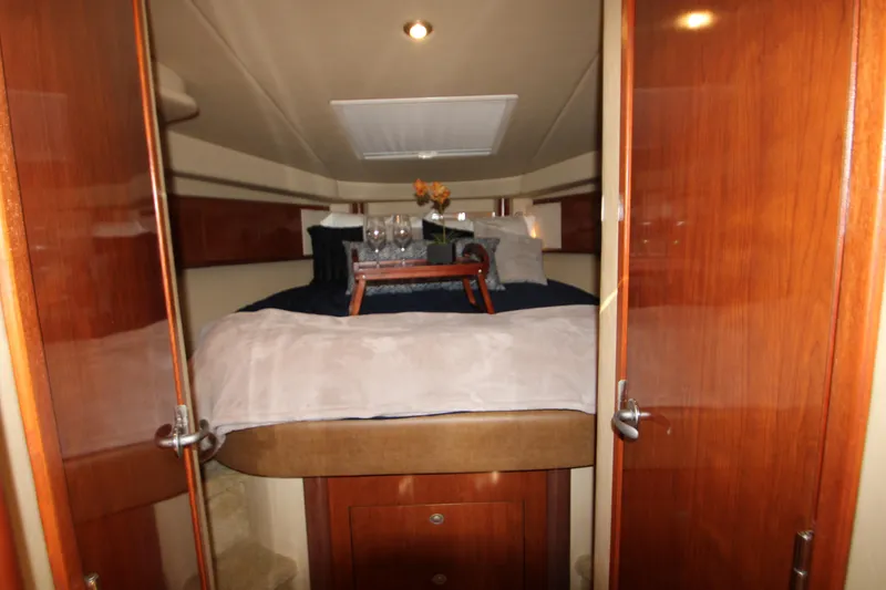 Slide: The Image of Luxurious interior of 2006 Sea Ray 400 Sundancer yacht with elegant wood finish. - 21