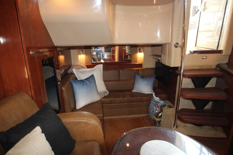 Slide: The Image of Luxurious interior of 2006 Sea Ray 400 Sundancer yacht with leather seating and elegant decor. - 32