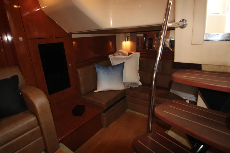 Slide: The Image of Luxurious interior of 2006 Sea Ray 400 Sundancer yacht with modern kitchen amenities. - 33