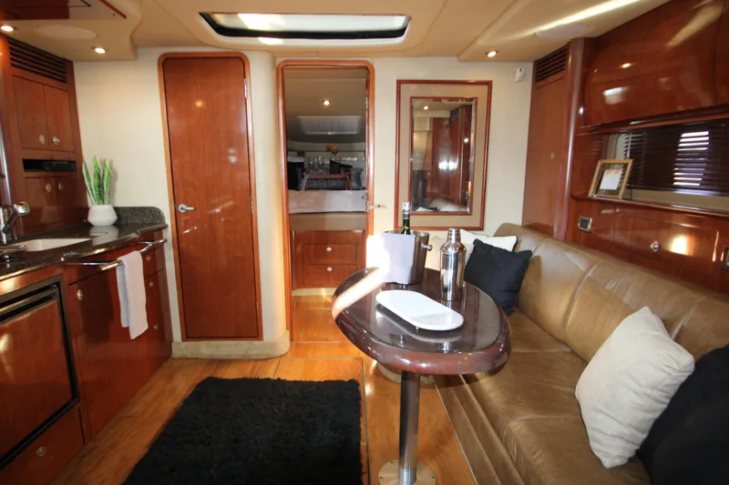 Slide: The Image of Luxurious interior of 2006 Sea Ray 400 Sundancer yacht with modern kitchen amenities. - 36