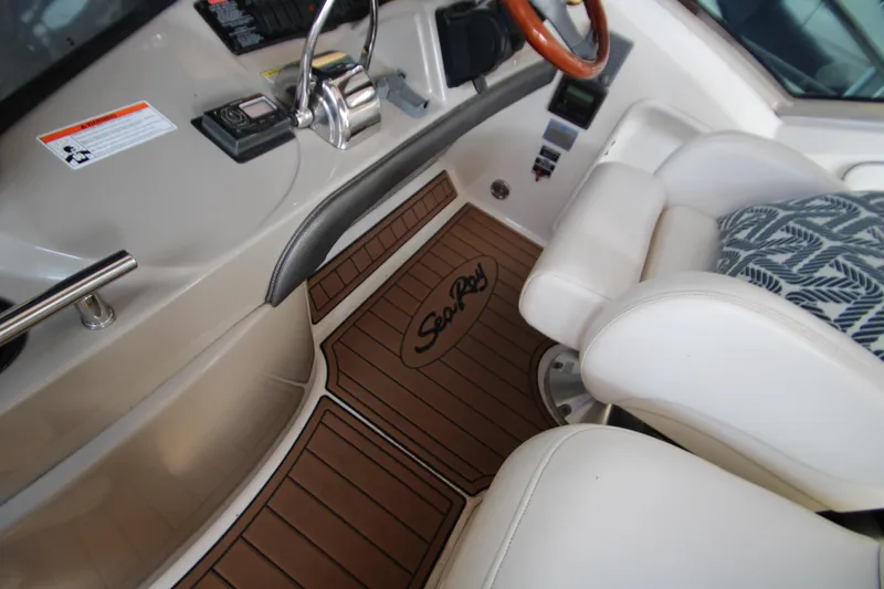 Slide: The Image of Luxurious interior of 2006 Sea Ray 400 Sundancer yacht with leather seating and wood finishes. - 49