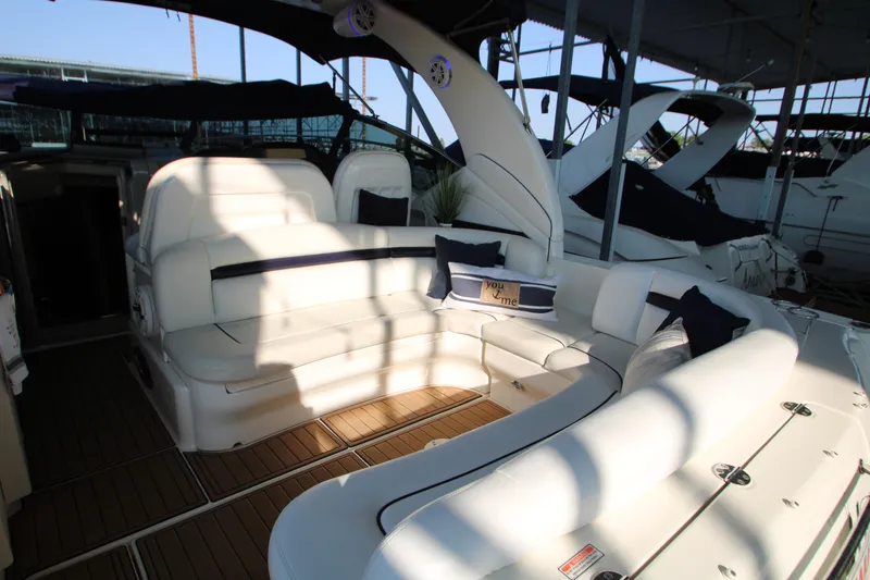 Slide: The Image of Interior of 2006 Sea Ray 400 Sundancer with helm and seating area. - 51