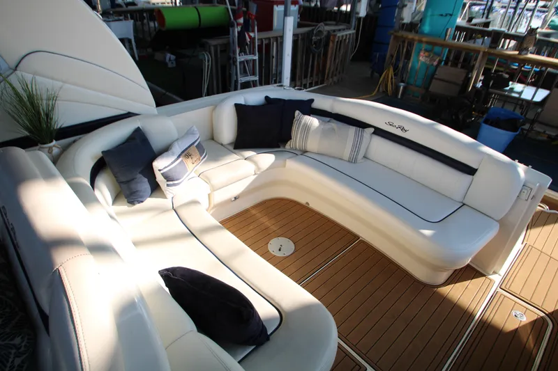 Slide: The Image of Luxurious seating area on 2006 Sea Ray 400 Sundancer yacht with plush cushions. - 59