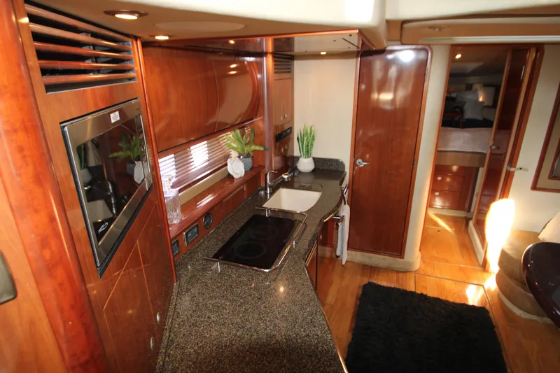 Slide: The Image of Luxurious seating area on 2006 Sea Ray 400 Sundancer yacht with plush cushions. - 7