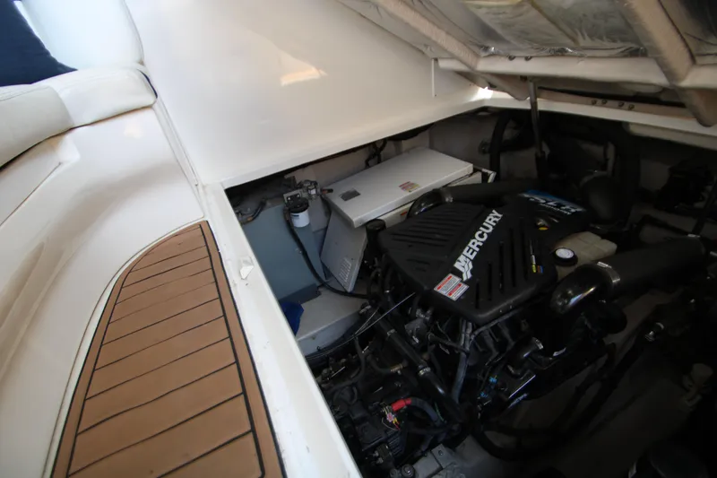 Slide: The Image of Engine compartment of 2006 Sea Ray 400 Sundancer with twin Mercury engines. - 70
