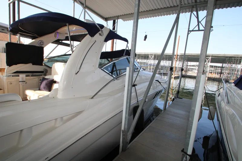 Slide: The Image of Engine room of 2006 Sea Ray 400 Sundancer with twin Mercury engines. - 73