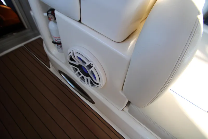 Slide: The Image of 2006 Sea Ray 400 Sundancer yacht docked in marina under covered slip. - 74