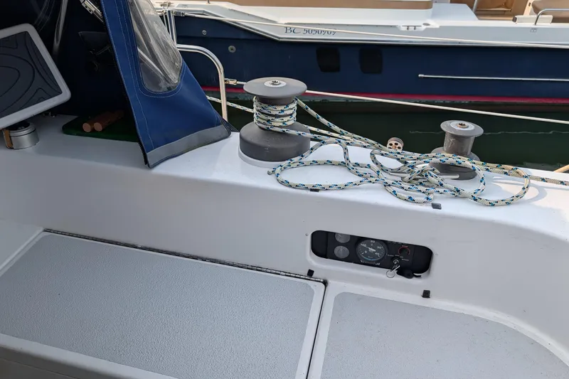 Slide: The Image of 1987 Cascade Center Cockpit sailboat with winch and rope in cockpit area. - 16