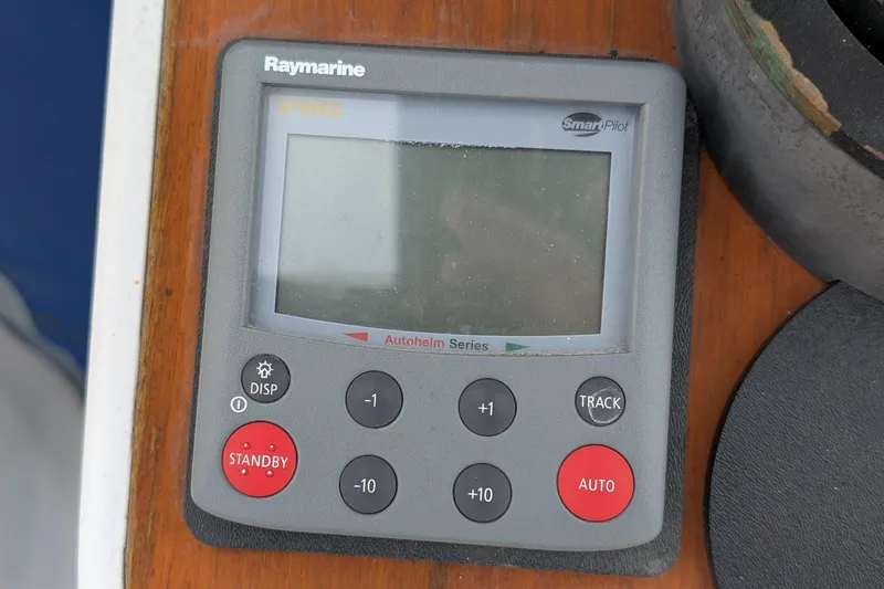 Slide: The Image of Raymarine SmartPilot control panel on 1987 Cascade Center Cockpit yacht. - 21