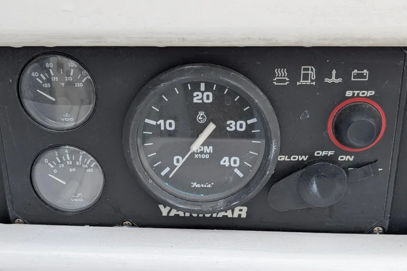 Slide: The Image of Control panel of a 1987 Cascade Center Cockpit boat with Yanmar RPM gauge. - 25