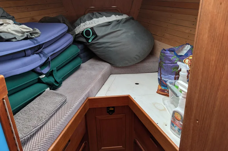 Slide: The Image of Cozy cabin interior of 1987 Cascade Center Cockpit with cushions and cleaning supplies. - 35