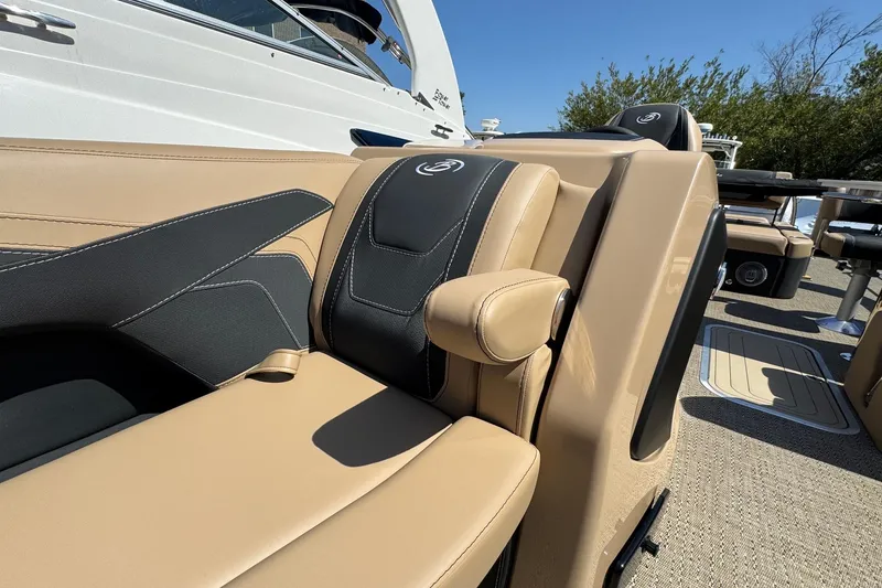 Slide: The Image of 2026 Barletta Cabrio 24UE pontoon boat with powerful V6 engine, parked outdoors. - 26