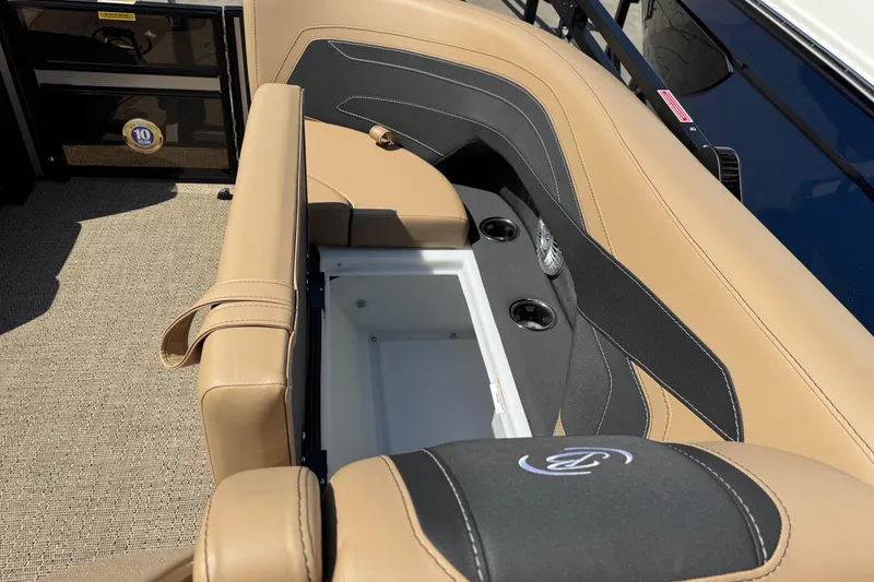 Slide: The Image of 2026 Barletta Cabrio 24UE pontoon boat with powerful outboard motor, parked outdoors. - 27