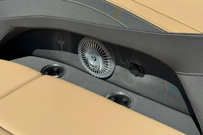 Slide: The Image of 2026 Barletta Cabrio 24UE pontoon boat on trailer, parked outdoors. - 29