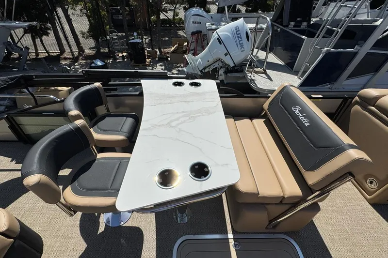 Slide: The Image of Luxurious seating on 2026 Barletta Cabrio 24UE pontoon boat, featuring elegant design and comfort. - 37
