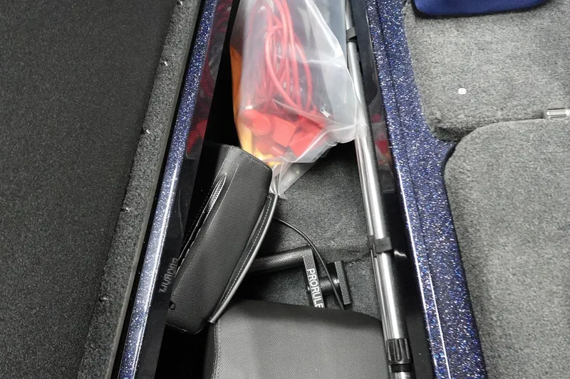 Slide: The Image of Storage compartment in 2025 Skeeter Solera 189 boat with fishing gear and accessories. - 19