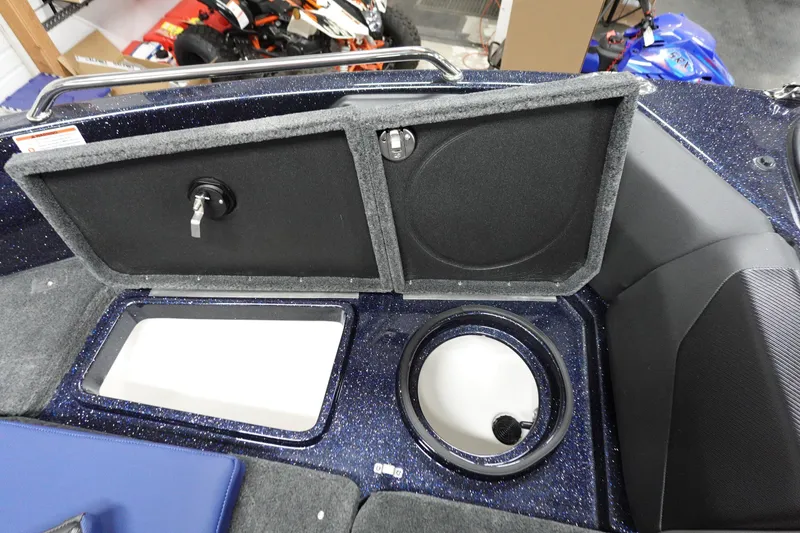 Slide: The Image of 2025 Skeeter Solera 189 boat interior with storage compartments and seating. - 22