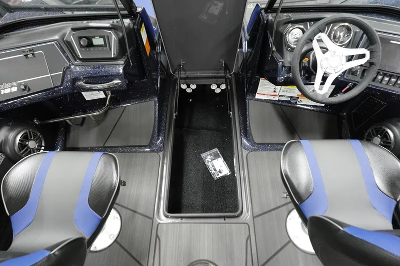 Slide: The Image of 2025 Skeeter Solera 189 boat interior with dual seats and modern dashboard. - 23