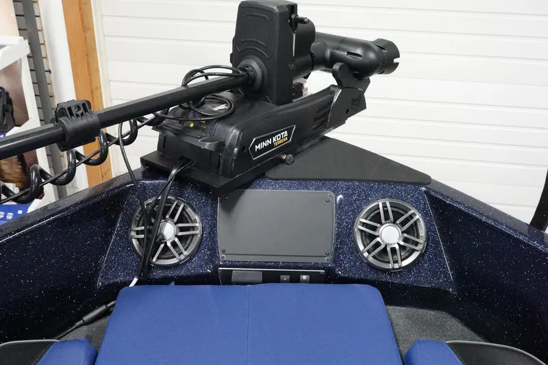 Slide: The Image of 2025 Skeeter Solera 189 boat interior with Minn Kota trolling motor and speakers. - 28