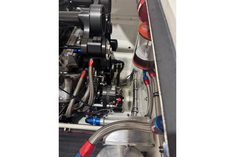 Slide: The Image of Close-up of a 1999 Skater 32B engine compartment with detailed components and wiring. - 15