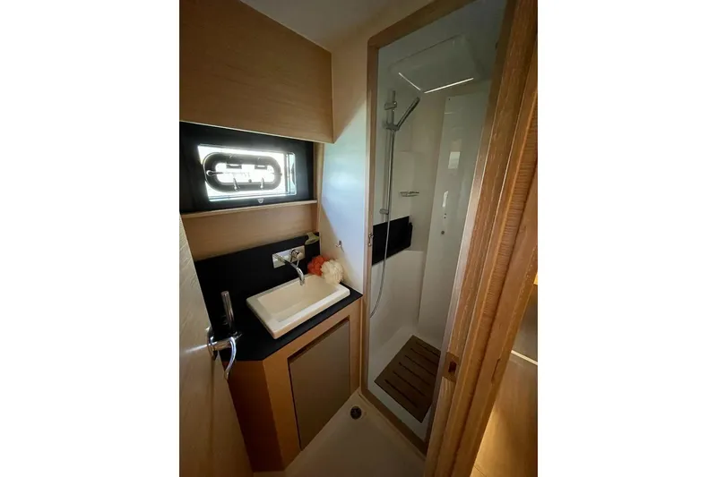 Slide: The Image of Bathroom interior of 2019 Nautitech 47 Power yacht, featuring modern sink and shower. - 3