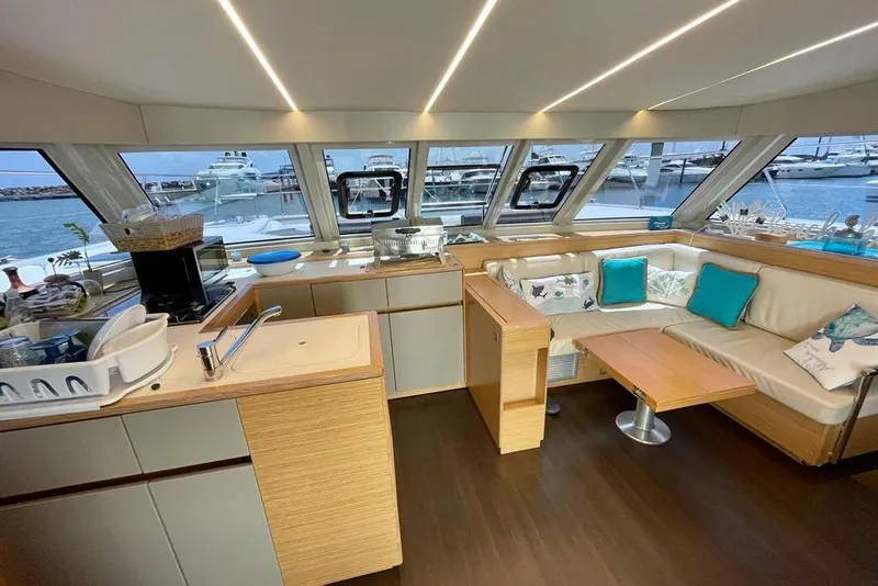 Slide: The Image of Luxurious interior of 2019 Nautitech 47 Power yacht with modern kitchen and seating area. - 5