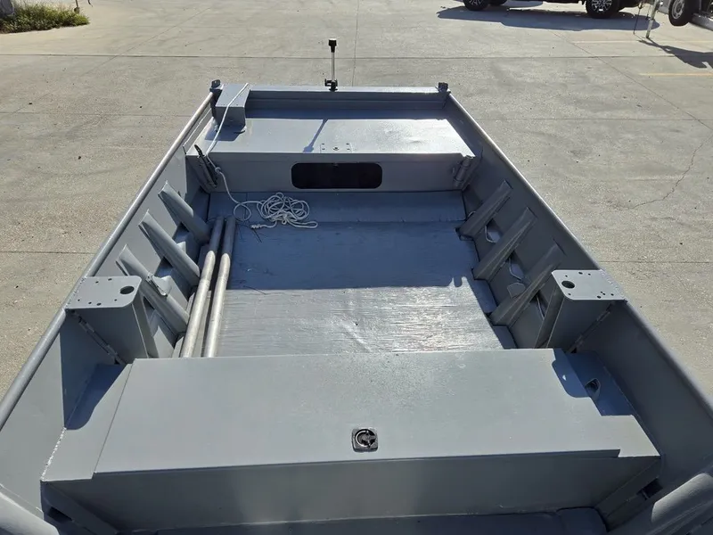 Slide: The Image of Interior view of a 1991 Alumaweld FLATBOAT on a parking lot. - 13