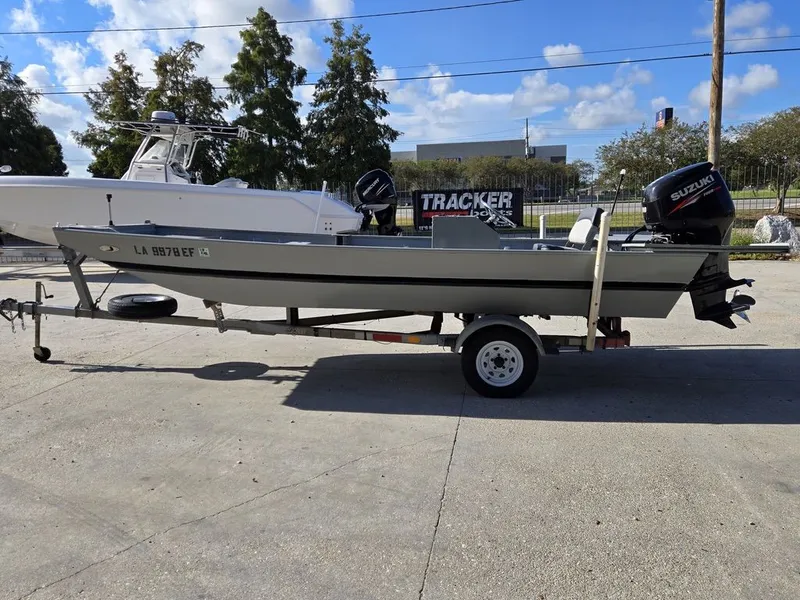 Slide: The Image of 1991 Alumaweld FLATBOAT on trailer with Suzuki outboard motor. - 8