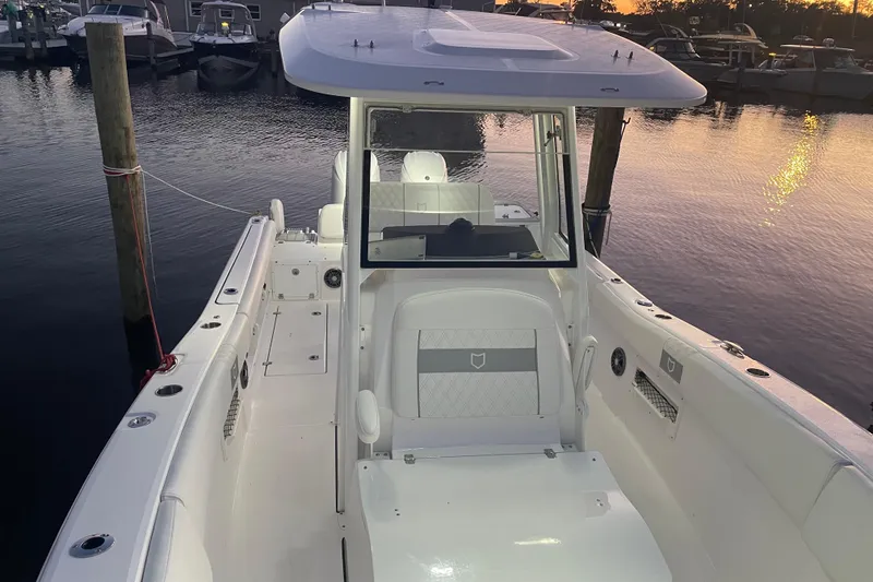 Slide: The Image of 2026 Sea Fox 268 Commander boat interior with cushioned seating and speakers. - 17